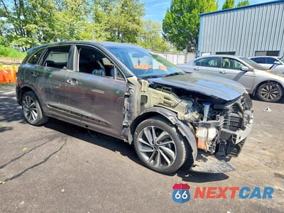 Czwarte zdjęcie samochodu z boku: 2017 KIA NIRO EX TOURING VIN:KNDCE3LC8H5075257 - miniatura