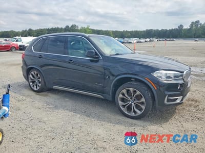 Czwarte zdjęcie samochodu z boku: 2018 BMW X5 XDR40E VIN:5UXKT0C56J0W04109 - miniatura