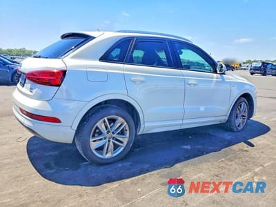 Trzecie zdjęcie samochodu z tyłu: 2018 AUDI Q3 PREMIUM VIN:WA1ECCFS1JR002807 - miniatura