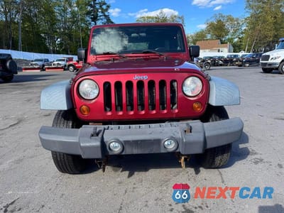 Piąte zdjęcie samochodu w środku: 2012 JEEP WRANGLER UNLIMITED SPORT VIN:1C4BJWDG0CL121971 - miniatura