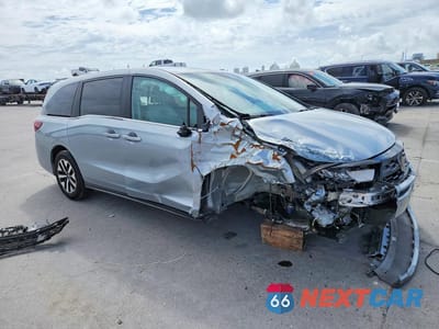 Czwarte zdjęcie samochodu z boku: 2025 HONDA ODYSSEY EXL VIN:5FNRL6H60SB083587 - miniatura