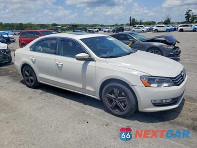 Czwarte zdjęcie samochodu z boku: 2014 VOLKSWAGEN PASSAT SE VIN:1VWBN7A38EC015151 - miniatura