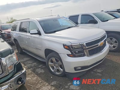 Czwarte zdjęcie samochodu z boku: 2016 CHEVROLET SUBURBAN K1500 LT VIN:1GNSKHKC0GR108902 - miniatura