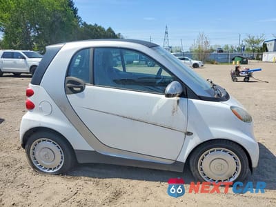 Czwarte zdjęcie samochodu z boku: 2012 SMART FORTWO PURE VIN:WMEEJ3BA1CK574384 - miniatura