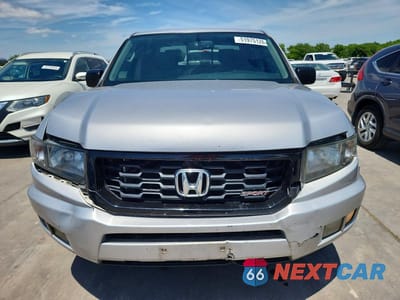 Piąte zdjęcie samochodu w środku: 2014 HONDA RIDGELINE SPORT VIN:5FPYK1F72EB011993 - miniatura