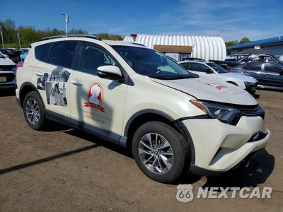 Czwarte zdjęcie samochodu z boku: 2018 TOYOTA RAV4 HYBRID LE VIN:JTMRJREV6JD222274 - miniatura