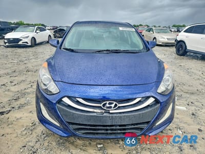 Piąte zdjęcie samochodu w środku: 2013 HYUNDAI ELANTRA GT BASE VIN:KMHD35LE6DU111806 - miniatura