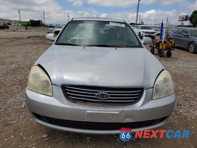 Piąte zdjęcie samochodu w środku: 2006 KIA OPTIMA LX VIN:KNAGE123965036128 - miniatura