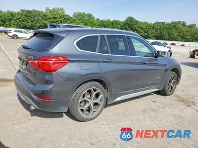 Trzecie zdjęcie samochodu z tyłu: 2018 BMW X1 VIN:WBXHT3C3XJ5K26023 - miniatura