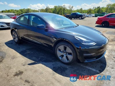 Czwarte zdjęcie samochodu z boku: 2022 TESLA MODEL 3 VIN:5YJ3E1EA5NF251868 - miniatura