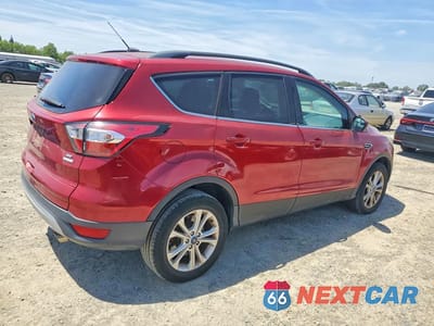 Trzecie zdjęcie samochodu z tyłu: 2018 FORD ESCAPE SE VIN:1FMCU0G92JUC63697 - miniatura