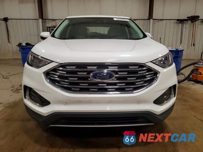 Piąte zdjęcie samochodu w środku: 2024 FORD EDGE TITANIUM VIN:2FMPK4K91RBA87944 - miniatura