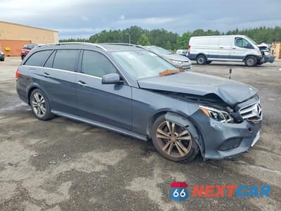 Czwarte zdjęcie samochodu z boku: 2014 MERCEDES-BENZ E 350 4MATIC WAGON VIN:WDDHH8JB3EA891029 - miniatura