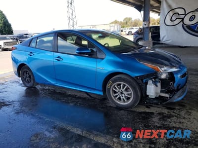 Czwarte zdjęcie samochodu z boku: 2021 TOYOTA PRIUS L ECO VIN:JTDKAMFU4M3127846 - miniatura