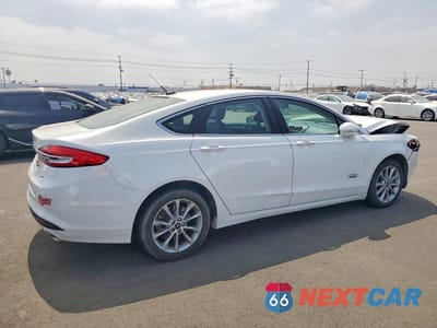 Trzecie zdjęcie samochodu z tyłu: 2018 FORD FUSION SE PHEV VIN:3FA6P0PU0JR257164 - miniatura