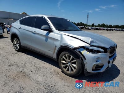Czwarte zdjęcie samochodu z boku: 2018 BMW X6 XDRIVE35I VIN:5UXKU2C56J0X51667 - miniatura