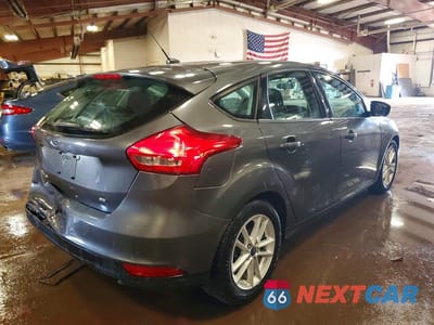 Trzecie zdjęcie samochodu z tyłu: 2017 FORD FOCUS SE VIN:1FADP3K23HL213960 - miniatura