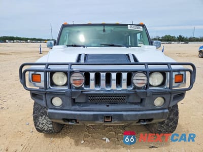 Piąte zdjęcie samochodu w środku: 2003 HUMMER H2 VIN:5GRGN23U53H122951 - miniatura