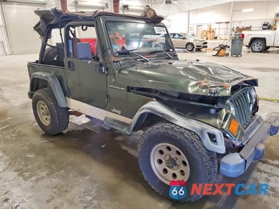 Czwarte zdjęcie samochodu z boku: 1998 JEEP WRANGLER / TJ SE VIN:1J4FY29P6WP770356 - miniatura
