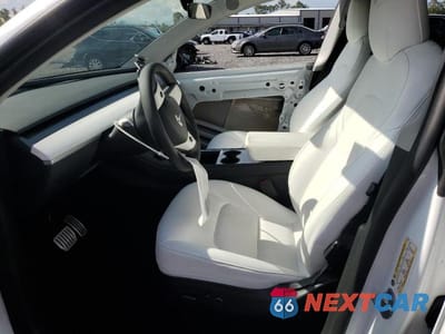 Zdjęcie 7 z 14 samochodu: 2022 TESLA MODEL Y VIN:7SAYGDEF0NF517779 - miniatura