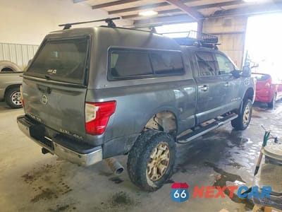 Trzecie zdjęcie samochodu z tyłu: 2016 NISSAN TITAN XD SL VIN:1N6BA1F48GN503341 - miniatura