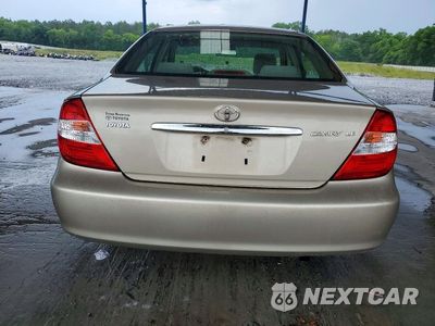 Zdjęcie 6 z 12 samochodu: 2003 TOYOTA CAMRY LE VIN:4T1BE32K13U163792 - miniatura