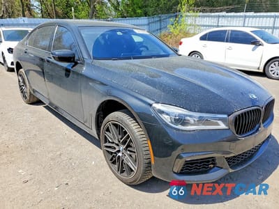 Czwarte zdjęcie samochodu z boku: 2018 BMW 750 XI VIN:WBA7F2C55JB238736 - miniatura