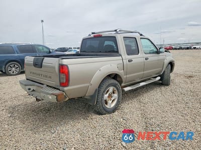 Trzecie zdjęcie samochodu z tyłu: 2001 NISSAN FRONTIER XE VIN:1N6ED27T61C377855 - miniatura
