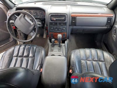 Zdjęcie 8 z 13 samochodu: 1999 JEEP GRAND CHEROKEE LIMITED VIN:1J4GW68N1XC671972 - miniatura