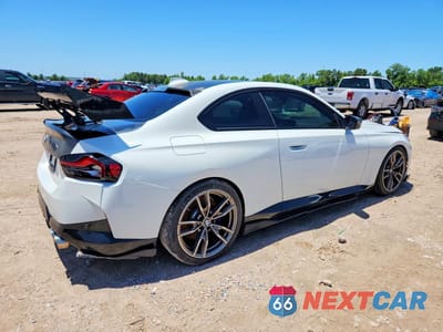 Trzecie zdjęcie samochodu z tyłu: 2022 BMW M240XI VIN:3MW53CM08N8C38780 - miniatura