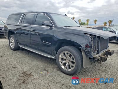 Czwarte zdjęcie samochodu z boku: 2015 GMC YUKON XL C1500 SLE VIN:1GKS1GKC6FR746404 - miniatura