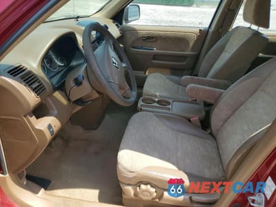 Zdjęcie 7 z 13 samochodu: 2004 HONDA CR-V LX VIN:JHLRD684X4C022603 - miniatura