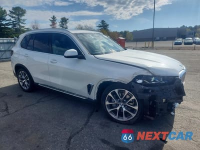Czwarte zdjęcie samochodu z boku: 2026 BMW X5 XDRIVE40I VIN:5UX23EU02T9400518 - miniatura