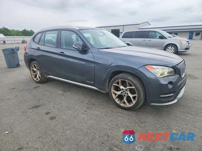 Czwarte zdjęcie samochodu z boku: 2015 BMW X1 XDRIVE28I VIN:WBAVL1C56FVY39234 - miniatura