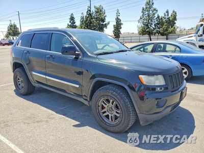 Czwarte zdjęcie samochodu z boku: 2013 JEEP GRAND CHEROKEE LAREDO VIN:1C4RJFAT5DC503883 - miniatura