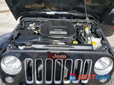 Zdjęcie 12 z 14 samochodu: 2016 JEEP WRANGLER UNLIMITED SAHARA VIN:1C4BJWEG1GL283693 - miniatura