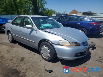 Czwarte zdjęcie samochodu z boku: 2001 HONDA ACCORD LX VIN:1HGCG66501A021149 - miniatura