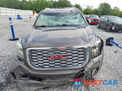 Piąte zdjęcie samochodu w środku: 2019 GMC YUKON DENALI VIN:1GKS1CKJ0KR330947 - miniatura