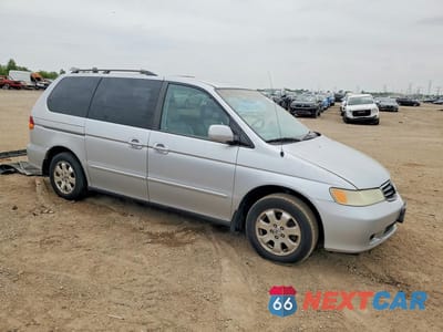 Czwarte zdjęcie samochodu z boku: 2003 HONDA ODYSSEY EXL VIN:5FNRL18953B154605 - miniatura