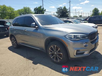 Czwarte zdjęcie samochodu z boku: 2014 BMW X5 XDRIVE35I VIN:5UXKR0C51E0C27888 - miniatura