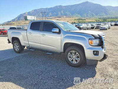 Czwarte zdjęcie samochodu z boku: 2016 GMC CANYON SLT VIN:1GTG6DE37G1145225 - miniatura
