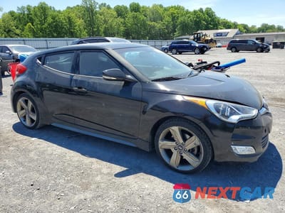 Czwarte zdjęcie samochodu z boku: 2013 HYUNDAI VELOSTER VIN:KMHTC6AE7DU157357 - miniatura