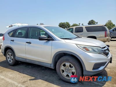 Czwarte zdjęcie samochodu z boku: 2015 HONDA CR-V LX VIN:2HKRM3H30FH559328 - miniatura
