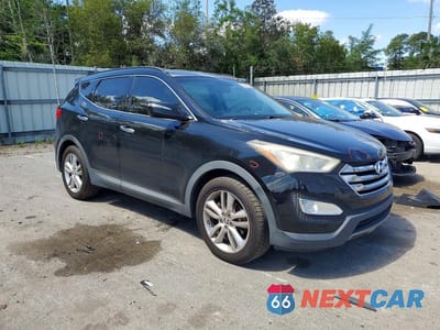 Czwarte zdjęcie samochodu z boku: 2014 HYUNDAI SANTA FE SPORT 2.0T VIN:5XYZUDLA5EG210697 - miniatura