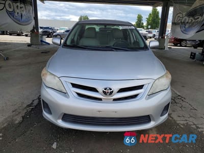 Piąte zdjęcie samochodu w środku: 2011 TOYOTA COROLLA LE VIN:JTDBU4EE5B9141718 - miniatura