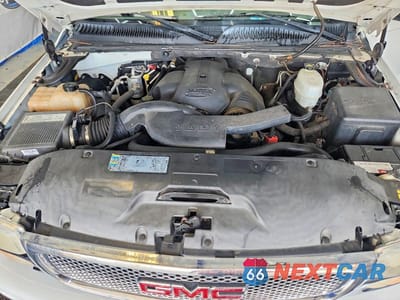 Zdjęcie 12 z 13 samochodu: 2006 GMC YUKON DENALI VIN:1GKEK63U86J154741 - miniatura