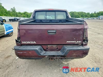 Zdjęcie 6 z 12 samochodu: 2010 HONDA RIDGELINE RT VIN:5FPYK1F20AB012350 - miniatura
