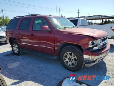 Czwarte zdjęcie samochodu z boku: 2004 CHEVROLET TAHOE C1500 VIN:1GNEC13Z44J179096 - miniatura