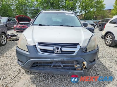Piąte zdjęcie samochodu w środku: 2004 HONDA CR-V LX VIN:SHSRD78414U215995 - miniatura
