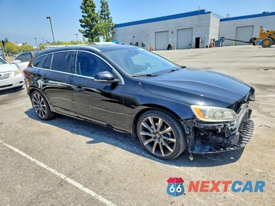 Czwarte zdjęcie samochodu z boku: 2015 VOLVO V60 PREMIER VIN:YV140MEK3F1259744 - miniatura